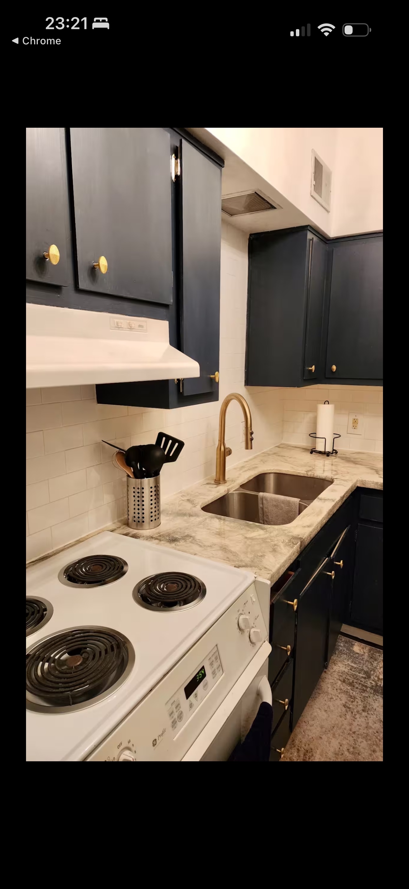 Modern kitchen with gold hardware