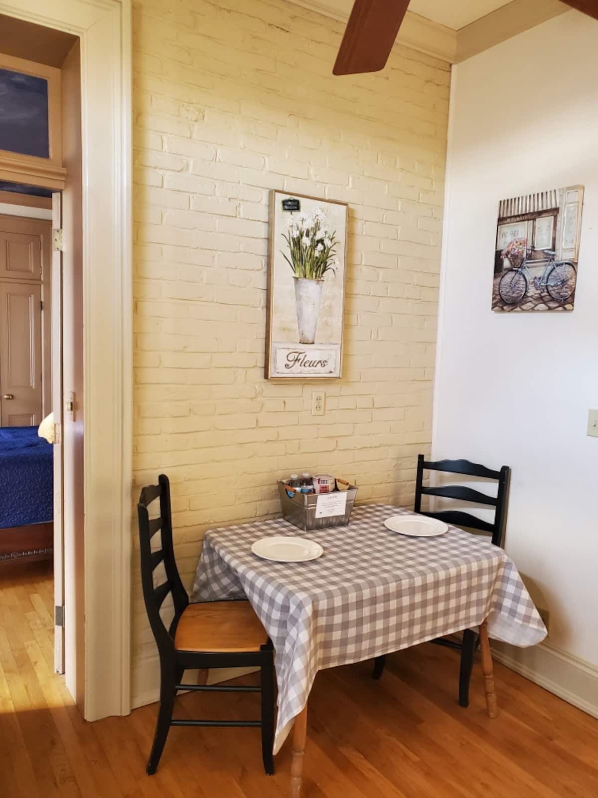 Breakfast nook with exposed brick